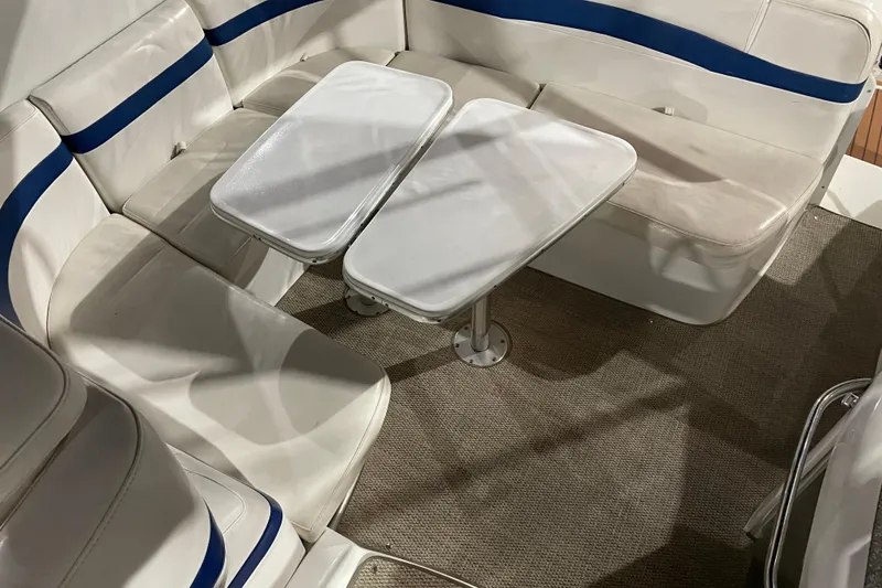 Slide: The Image of 2008 Formula 34 Performance Cruiser interior with white seating and dual tables. - 15