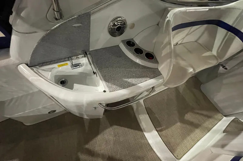 Slide: The Image of 2008 Formula 34 Performance Cruiser interior with seating and sink area. - 17