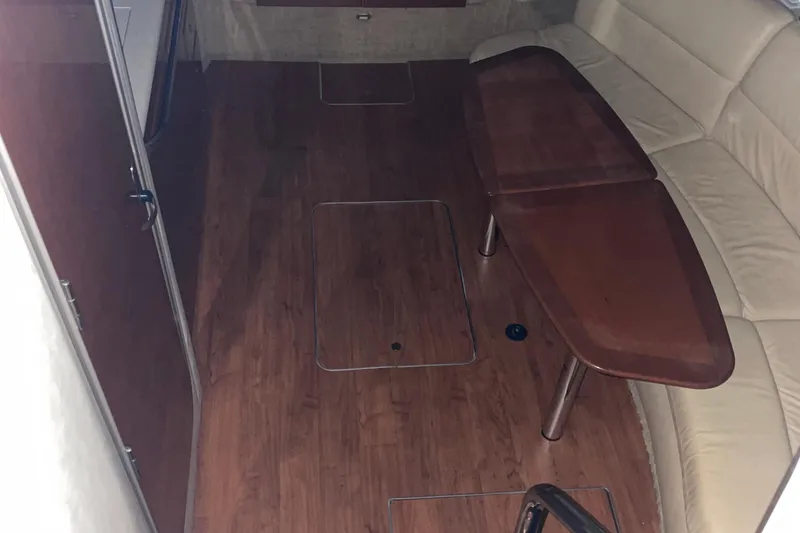 Slide: The Image of Interior of 2008 Formula 34 Performance Cruiser with wooden flooring and beige seating. - 19