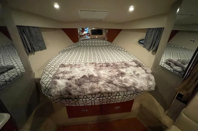 Slide: The Image of 2008 Formula 34 Performance Cruiser cabin with cozy bed and modern decor. - 21