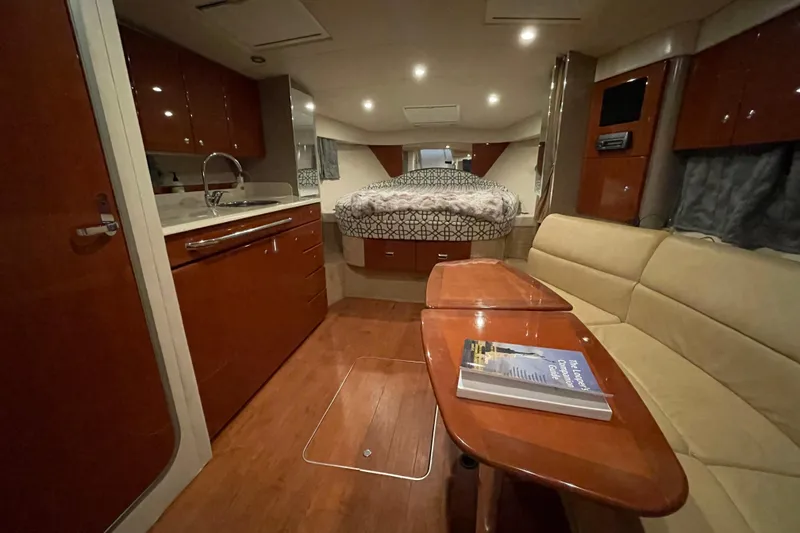 Slide: The Image of 2008 Formula 34 Performance Cruiser interior with kitchen, seating, and bed. - 29