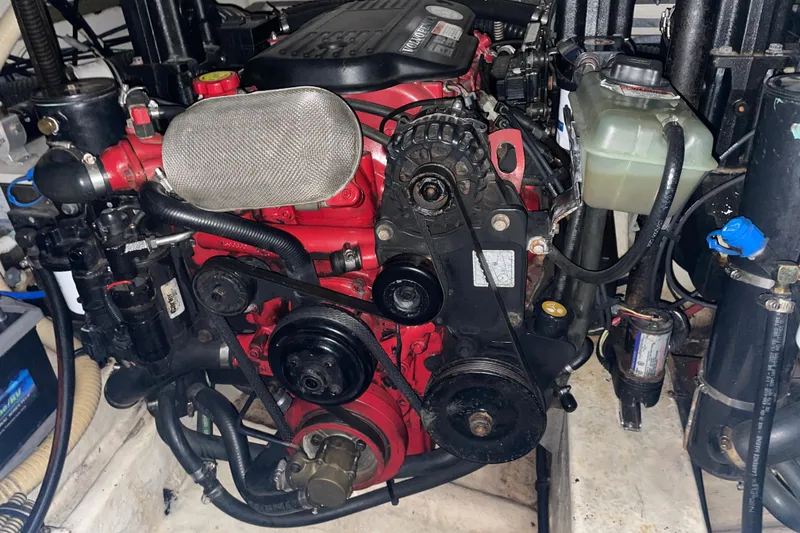 Slide: The Image of 2008 Formula 34 Performance Cruiser engine, detailed view of components and hoses. - 33