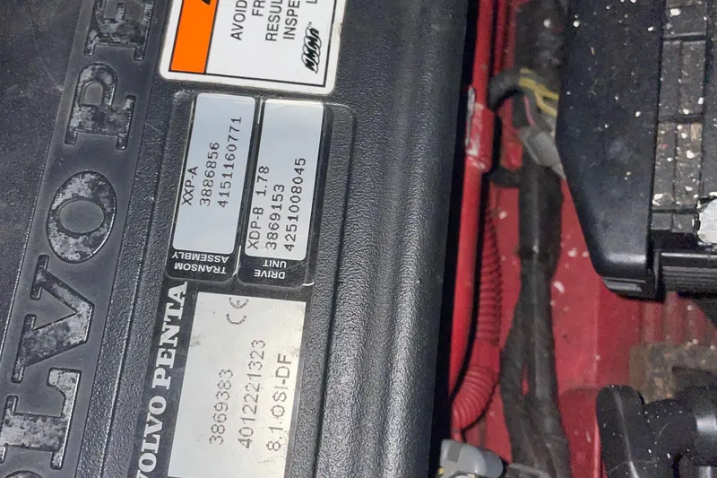 Slide: The Image of Close-up of Volvo Penta engine labels on a 2008 Formula 34 Performance Cruiser. - 38