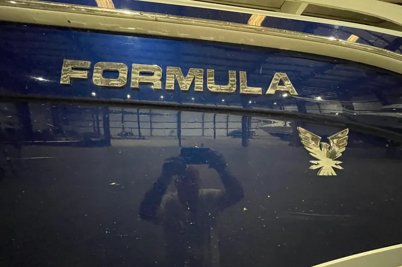 Slide: The Image of 2008 Formula 34 Performance Cruiser boat with logo and reflection in blue finish. - 6