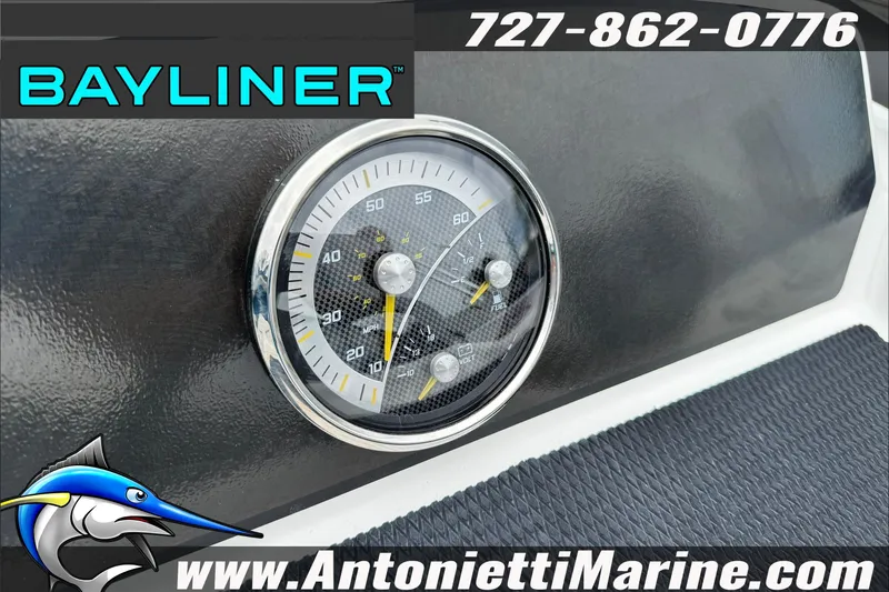 Slide: The Image of Dashboard of 2026 Bayliner Element E17 boat with speedometer and branding. - 16