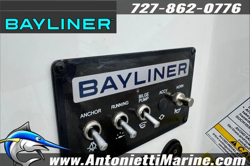 Slide: The Image of Control panel of 2026 Bayliner Element E17 boat with switches for anchor, bilge pump, and horn. - 17