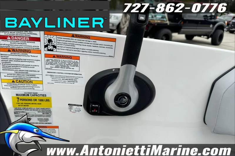 Slide: The Image of 2026 Bayliner Element E17 boat controls with safety warnings and capacity details. - 18
