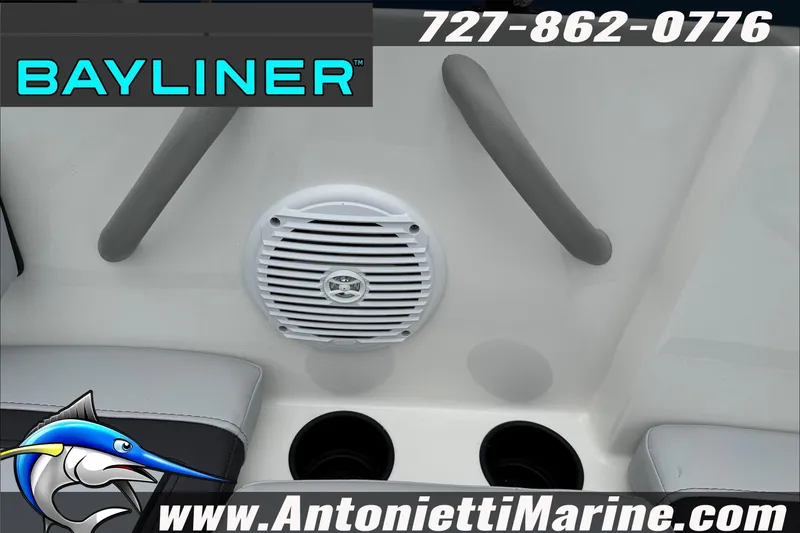 Slide: The Image of 2026 Bayliner Element E17 boat interior with speaker and cup holders. - 21