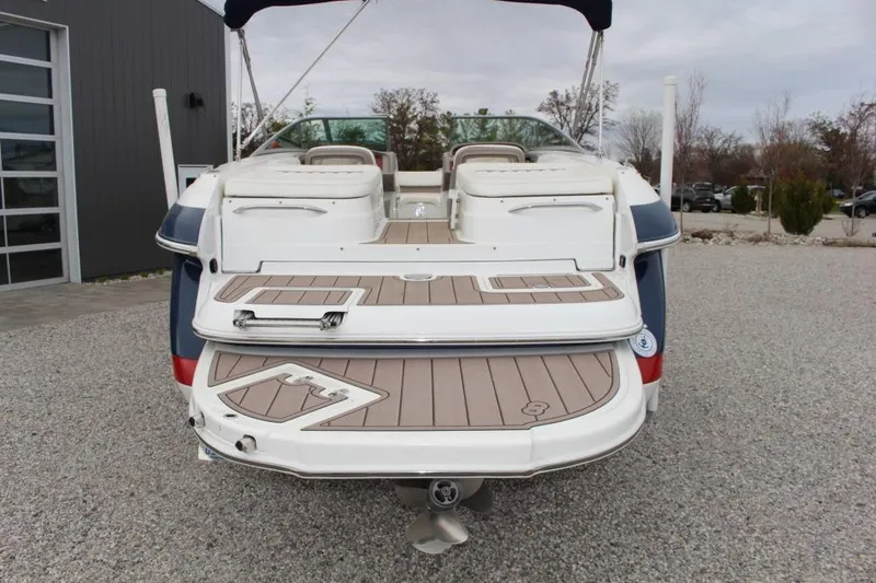 Slide: The Image of Rear view of a 2004 Cobalt 262 boat with swim platform and seating. - 3
