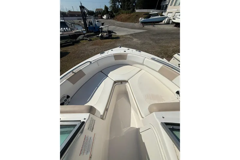 Slide: The Image of 2019 Robalo R227 Dual Console boat interior with spacious seating and clean design. - 4