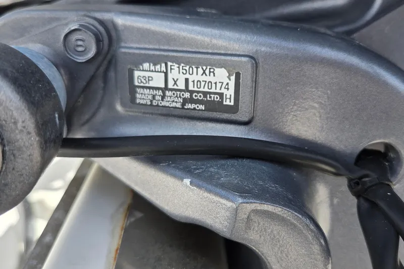 Slide: The Image of Close-up of Yamaha motor label on 2008 Key West 2020 Center Console boat. - 13