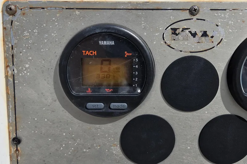 Slide: The Image of Yamaha tachometer on 2008 Key West Center Console boat dashboard. - 7
