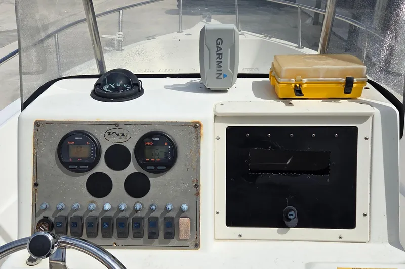 Slide: The Image of Center console of a 2008 Key West boat with Garmin navigation and Yamaha gauges. - 8