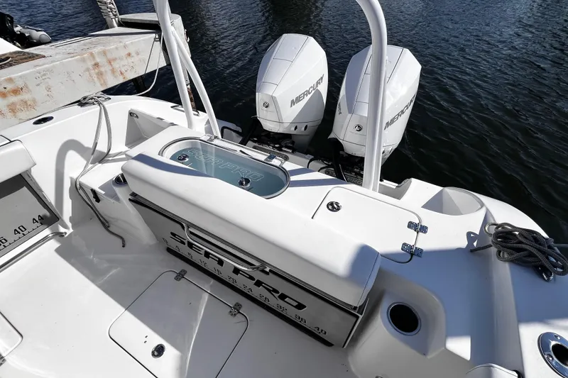 Slide: The Image of 2022 Sea Pro 259 Deep V CC boat with dual Mercury engines at dock. - 3