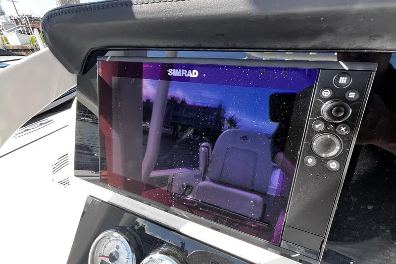 Slide: The Image of Simrad display on 2022 Sea Pro 259 Deep V CC boat dashboard. - 6