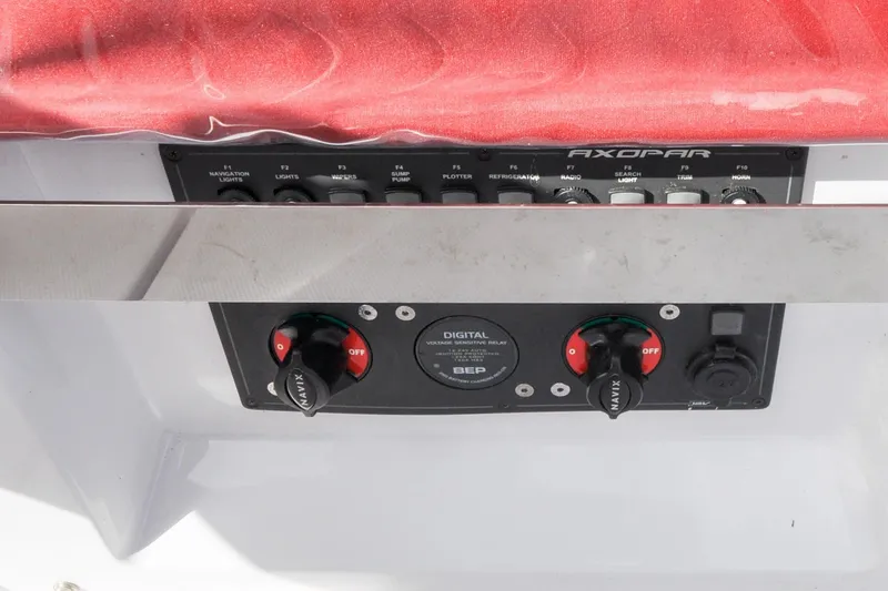 Slide: The Image of Axopar 24 HT - Cockpit - Electrical Panel - 14