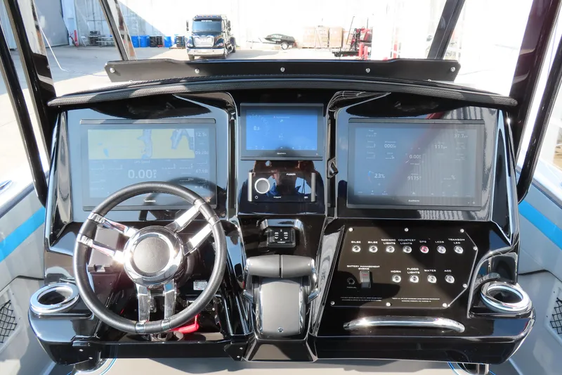 Slide: The Image of 2024 Sunsation 32CCX dashboard with advanced navigation and control systems. - 7