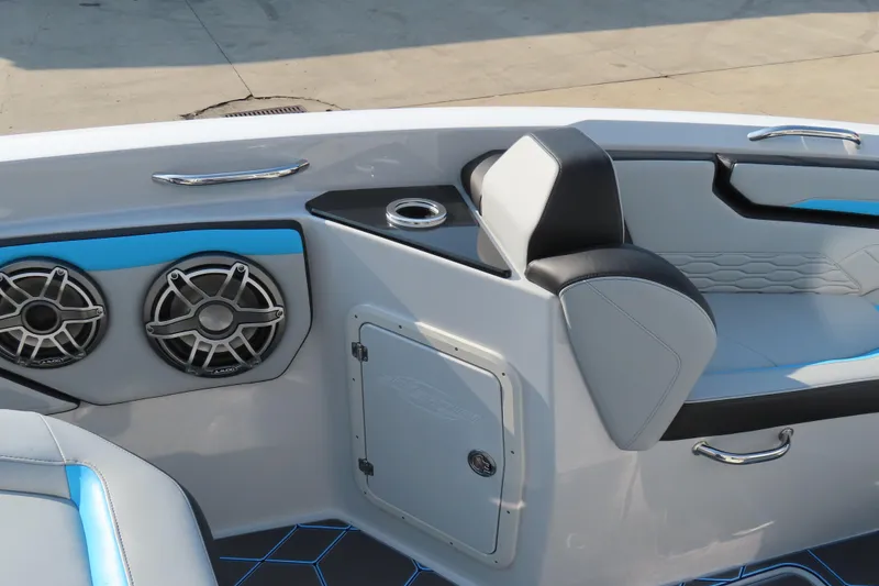 Slide: The Image of 2024 Sunsation 32CCX boat interior with speakers, seating, and modern design elements. - 8