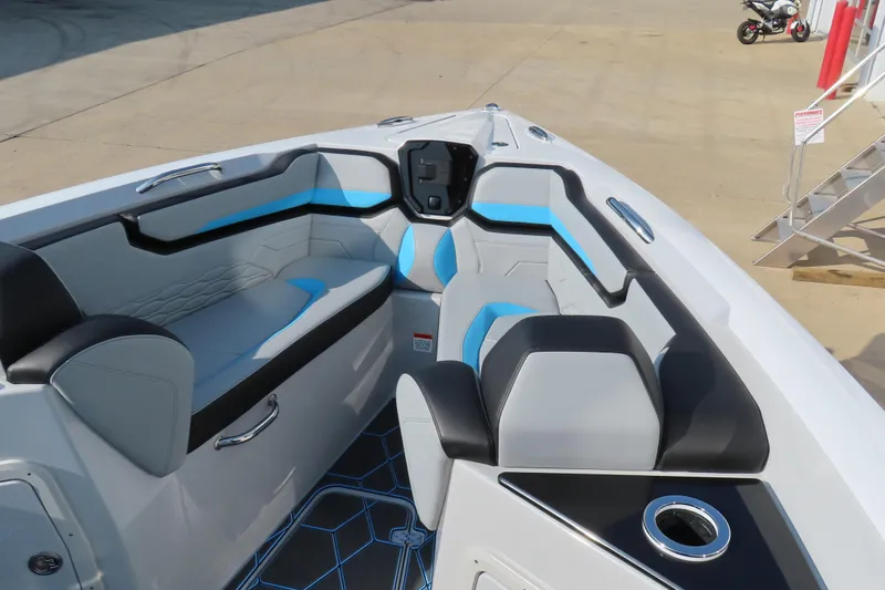 Slide: The Image of 2024 Sunsation 32CCX boat interior with modern seating and sleek design. - 9