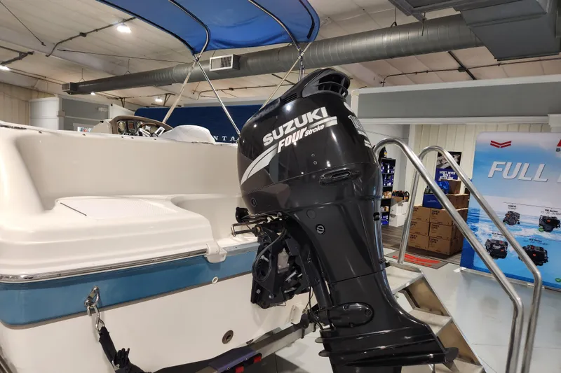 Slide: The Image of 2007 Hurricane FunDeck GS 194 OB boat interior with seating and storage compartment. - 19