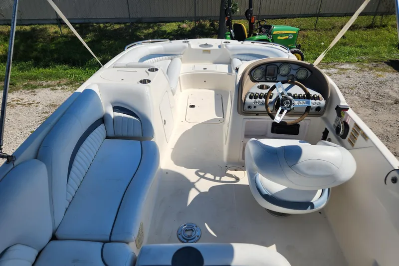 Slide: The Image of Dashboard of 2007 Hurricane FunDeck GS 194 OB boat with steering wheel and gauges. - 8