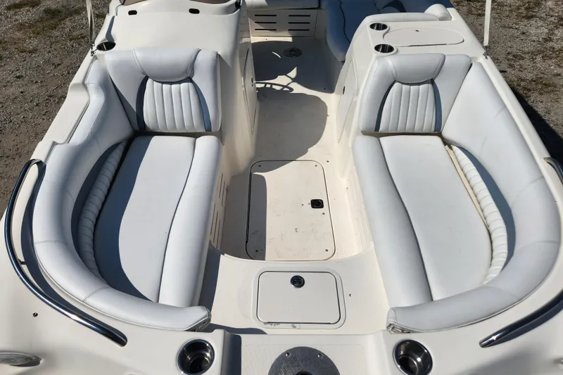 Slide: The Image of 2007 Hurricane FunDeck GS 194 OB dashboard with gauges, switches, and steering wheel. - 9