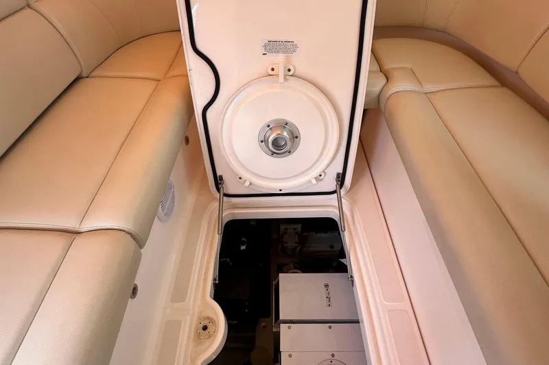 Slide: The Image of 2007 Tiara Yachts 3900 Sovran interior with open hatch and beige seating. - 16