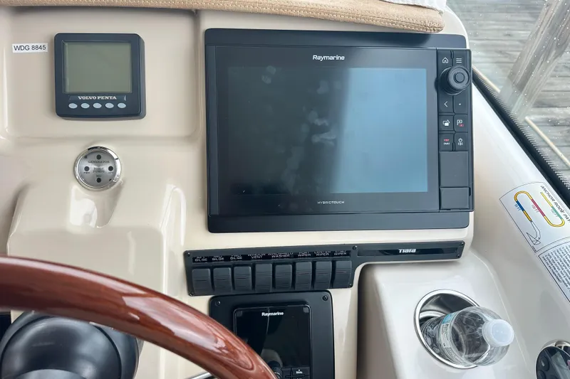 Slide: The Image of Dashboard of 2007 Tiara Yachts 3900 Sovran with Raymarine display and controls. - 7