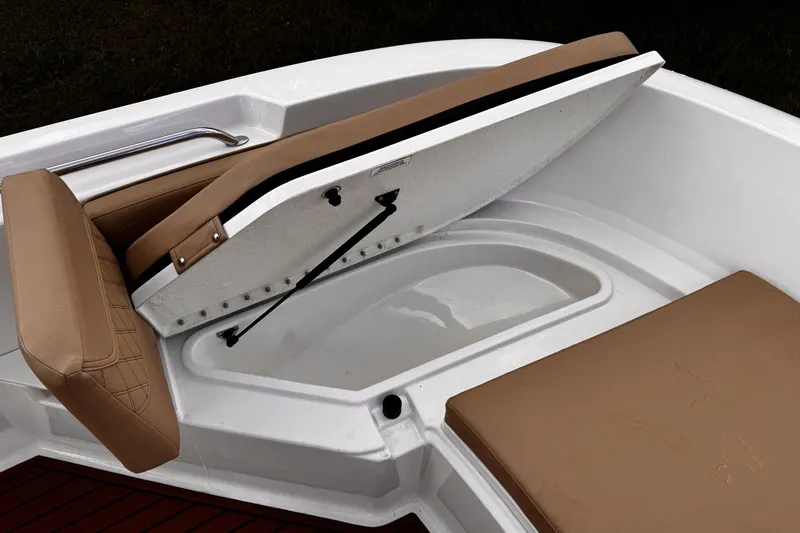 Slide: The Image of 2023 Bayliner Trophy T20CC boat seat with storage compartment open. - 14