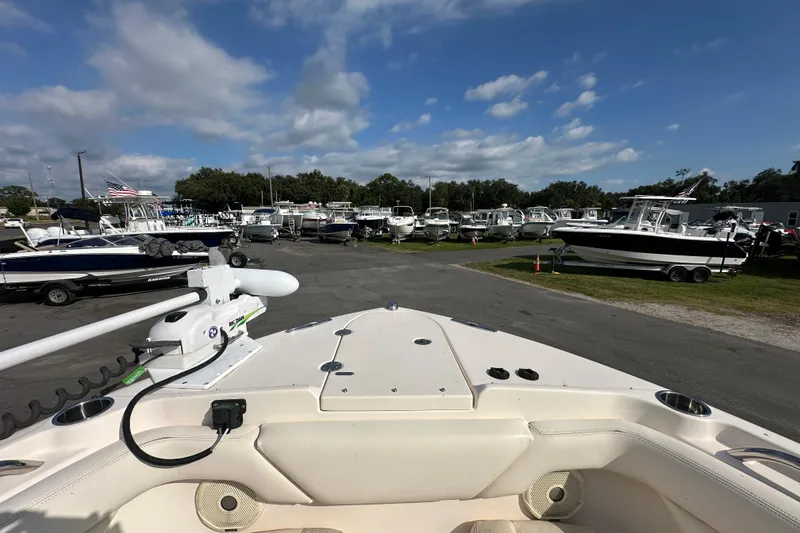 Slide: The Image of 2016 Grady-White Freedom 275 boat interior with seating and storage compartments. - 100