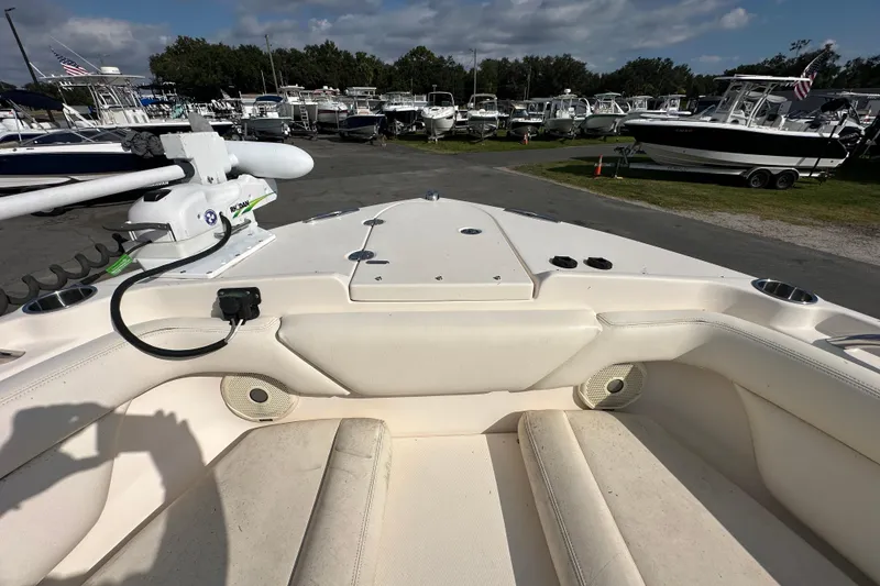 Slide: The Image of 2016 Grady-White Freedom 275 boat interior with seating and storage compartments. - 101