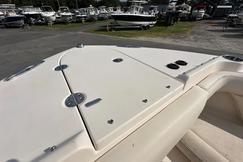 Slide: The Image of Open storage compartment on a 2016 Grady-White Freedom 275 boat, showcasing ample space. - 104