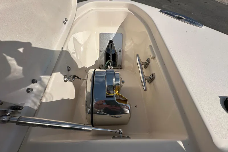 Slide: The Image of Open storage compartment on a 2016 Grady-White Freedom 275 boat. - 105
