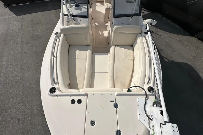 Slide: The Image of 2016 Grady-White Freedom 275 boat with dual Yamaha 200 engines, docked outdoors. - 108