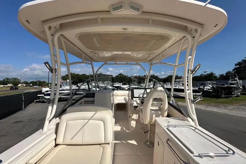 Slide: The Image of 2016 Grady-White Freedom 275 boat for sale at dealership, sunny day. - 19