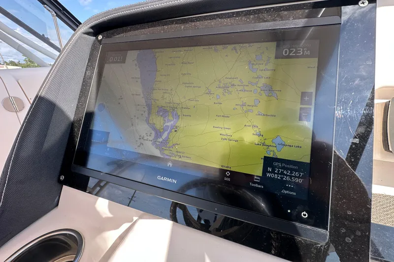 Slide: The Image of Control panel of a 2016 Grady-White Freedom 275 boat with Yamaha electronics. - 29