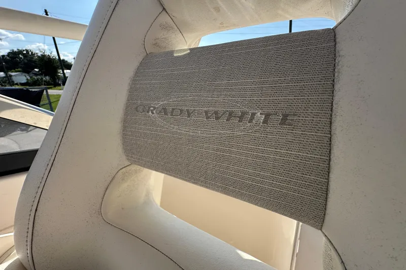 Slide: The Image of Storage compartment in a 2016 Grady-White Freedom 275 boat with fire extinguisher and equipment. - 43