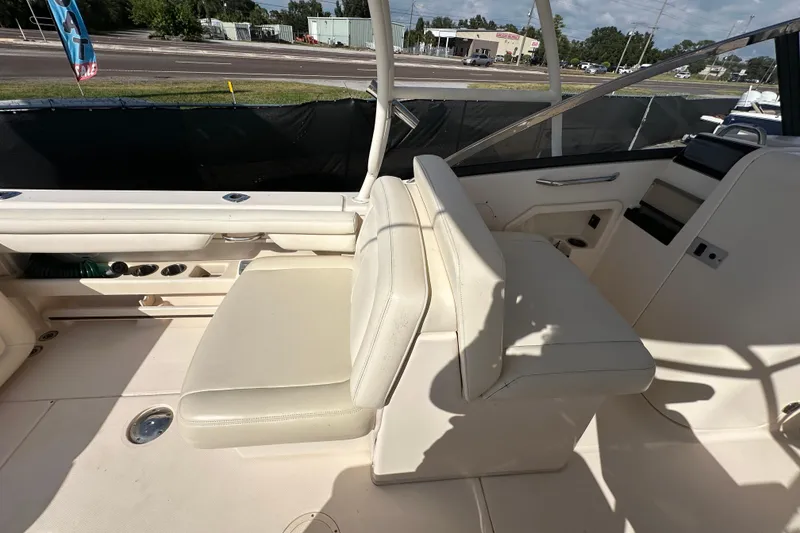Slide: The Image of Open storage compartment on 2016 Grady-White Freedom 275 boat deck. - 69