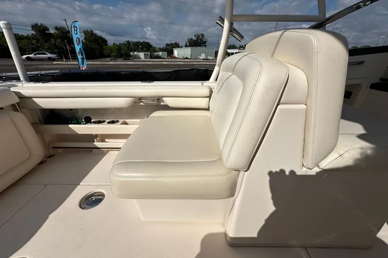 Slide: The Image of Control panel of a 2016 Grady-White Freedom 275 boat with dual battery switches. - 70