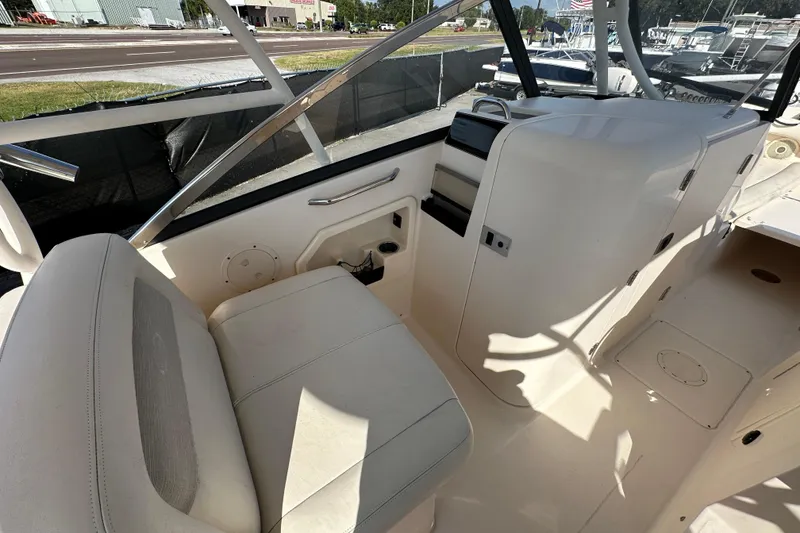 Slide: The Image of 2016 Grady-White Freedom 275 boat engine flush ports and electrical outlet. - 71