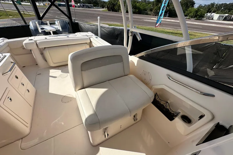 Slide: The Image of Close-up of 2016 Grady-White Freedom 275 logo on boat exterior. - 74