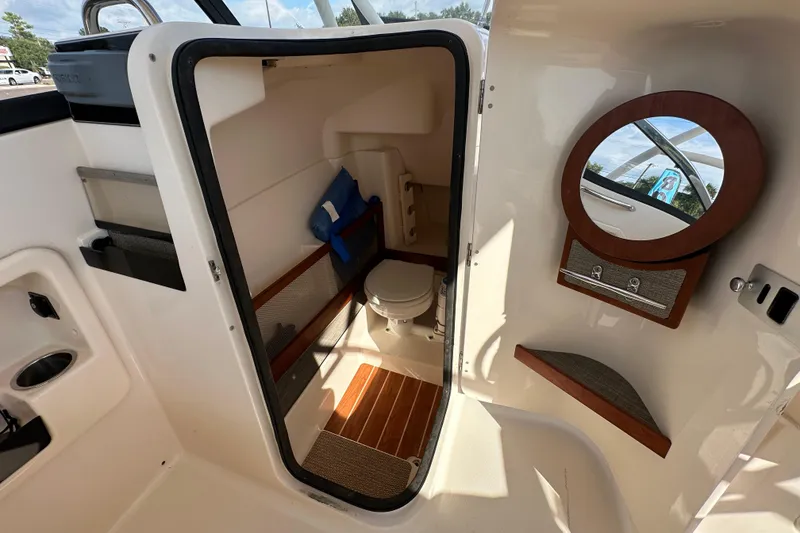 Slide: The Image of Close-up of Yamaha outboard motor part on 2016 Grady-White Freedom 275 boat. - 78