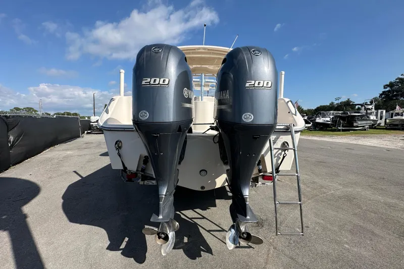 Slide: The Image of 2016 Grady-White Freedom 275 boat with "Bad Daddy" graphic and fish design. - 9