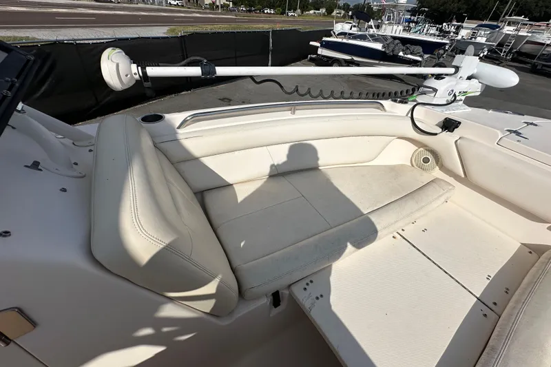 Slide: The Image of 2016 Grady-White Freedom 275 boat interior with seating and storage compartments. - 94