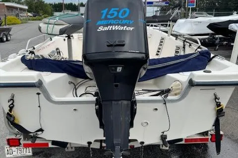 Slide: The Image of 2002 Seafox 195 Bay Fisher boat with Mercury 150 Saltwater engine, rear view. - 3