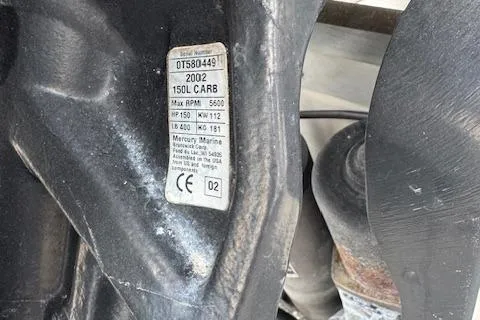 Slide: The Image of Label on 2002 Seafox 195 Bay Fisher boat engine, showing specifications and serial number. - 5