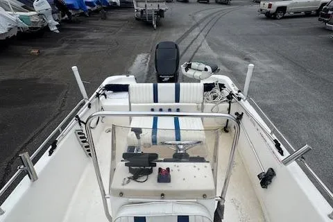 Slide: The Image of 2002 Seafox 195 Bay Fisher boat interior with steering console and seating. - 8