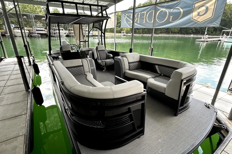 Slide: The Image of 2025 Godfrey AquaPatio 255 SDC Slide pontoon boat with spacious seating and modern design. - 8
