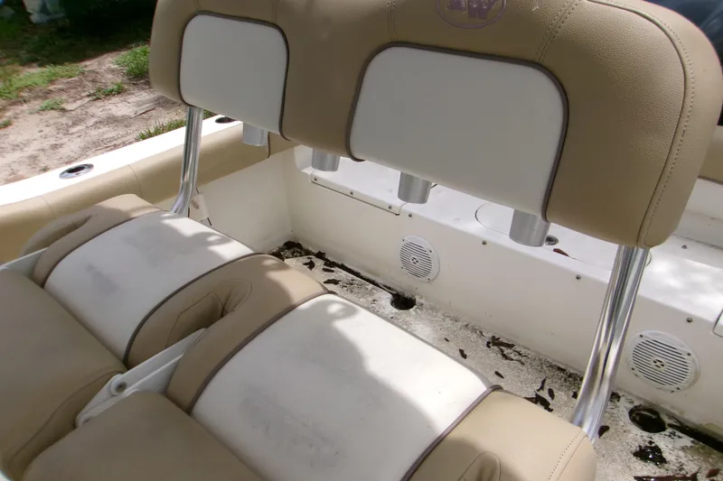 Slide: The Image of 2020 Key West 219 FS boat interior with tan and white seating. - 5