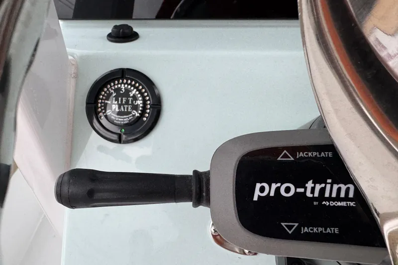 Slide: The Image of Control panel of 2026 Blazer Bay 2440 boat with lift plate and pro-trim features. - 12